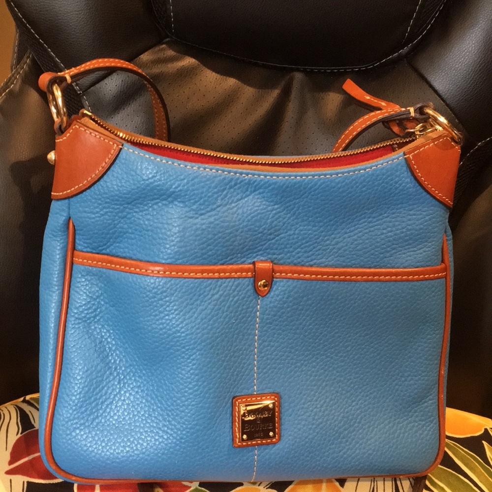 Dooney & Bourke cross body bag. Aqua blue